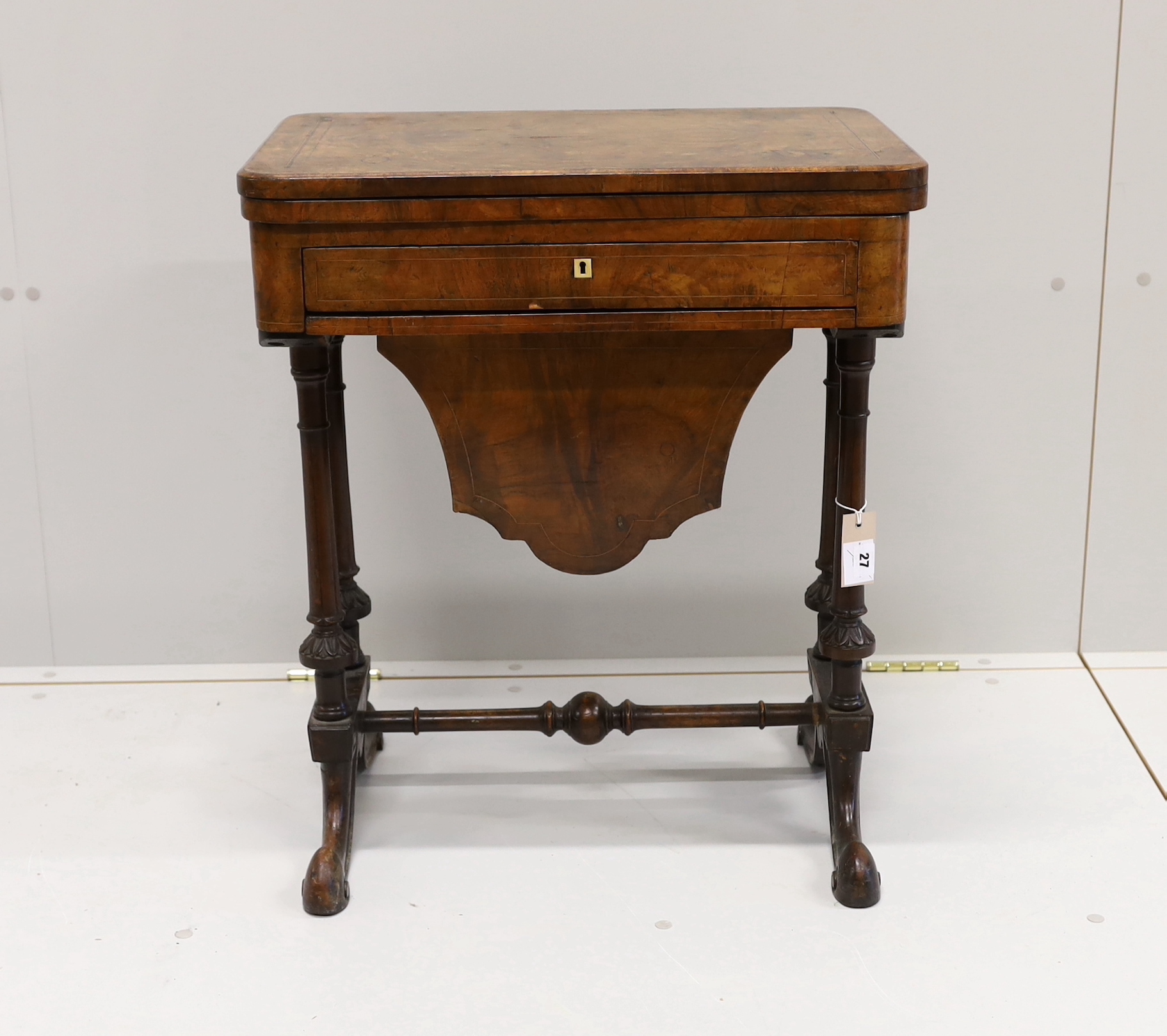 A Victorian figured walnut rectangular sewing / games table, width 58cm, depth 41cm, height 69cm